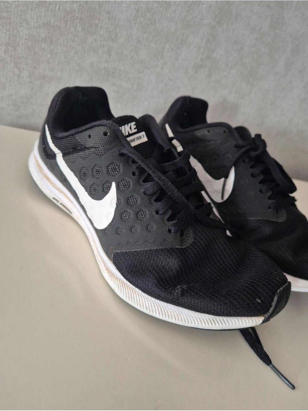 Nike Men's Black Athletic Running Shoes with White Swoosh